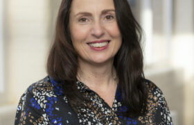 Co-Chair Fiona smiling in Sunny Bank Mills